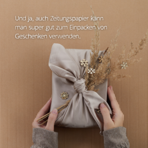 Liebevoll verpacktes Weihanchtsgeschenk, mit dem Hinweis, dass auch Zeitungspapier als Geschenkpapier verwendet werden kann